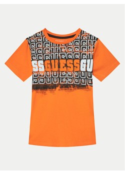 Guess T-Shirt L5RI23 K8HM4 Pomarańczowy Regular Fit ze sklepu MODIVO w kategorii T-shirty chłopięce - zdjęcie 181145324