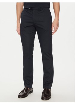Tommy Hilfiger Chinosy Denton MW0MW38863 Granatowy Slim Fit ze sklepu MODIVO w kategorii Spodnie męskie - zdjęcie 181145340