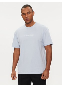 Calvin Klein T-Shirt Hero K10K111346 Błękitny Regular Fit ze sklepu MODIVO w kategorii T-shirty męskie - zdjęcie 181147301