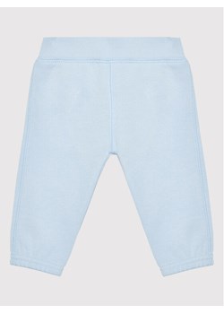 United Colors Of Benetton Spodnie dresowe 3J70AF009 Błękitny Regular Fit ze sklepu MODIVO w kategorii Spodnie i półśpiochy - zdjęcie 181148291