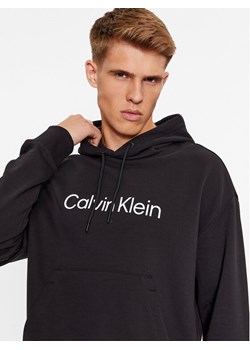 Calvin Klein Bluza Hero K10K111345 Czarny Regular Fit ze sklepu MODIVO w kategorii Bluzy męskie - zdjęcie 181148523