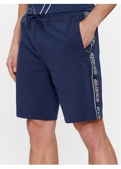 Guess Szorty materiałowe Arlo Z2YD02 K6ZS1 Granatowy Loose Fit ze sklepu MODIVO w kategorii Spodenki męskie - zdjęcie 181152102