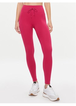 Guess Legginsy Rib-Seamless V4RB00 Z3CC0 Różowy Slim Fit ze sklepu MODIVO w kategorii Spodnie damskie - zdjęcie 181152381