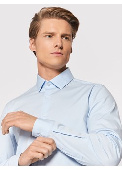 Calvin Klein Koszula Poplin K10K108229 Niebieski Slim Fit ze sklepu MODIVO w kategorii Koszule męskie - zdjęcie 181154233