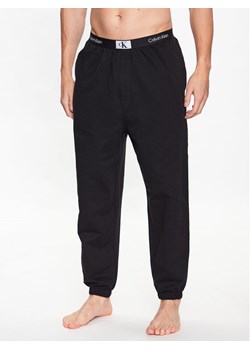 Calvin Klein Underwear Spodnie piżamowe 000NM2393E Czarny Regular Fit ze sklepu MODIVO w kategorii Piżamy męskie - zdjęcie 181154234