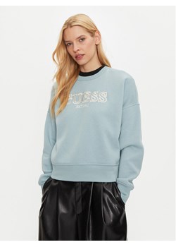 Guess Bluza V4BQ03 KCHX0 Niebieski Regular Fit ze sklepu MODIVO w kategorii Bluzy damskie - zdjęcie 181158120