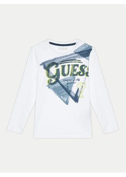 Guess Bluzka L4BI28 I3Z14 Biały Regular Fit ze sklepu MODIVO w kategorii T-shirty chłopięce - zdjęcie 181160293