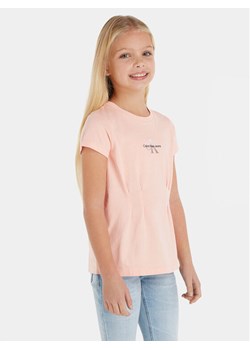 Calvin Klein Jeans T-Shirt Monogram IG0IG02103 Różowy Regular Fit ze sklepu MODIVO w kategorii Bluzki dziewczęce - zdjęcie 181160484