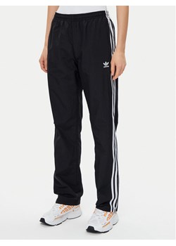 adidas Spodnie dresowe Woven JD5335 Czarny Loose Fit - id: 0000304500824 - marki adidas - 181160772 adidas Spodnie dresowe Woven JD5335 Czarny Loose Fit ze sklepu MODIVO w kategorii Spodnie damskie - zdjęcie 181160772