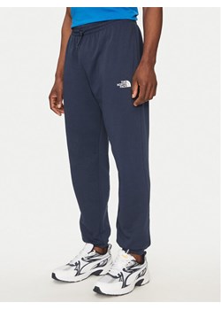 The North Face Spodnie dresowe Simple Dome Light NF0A8C41 Granatowy Regular Fit ze sklepu MODIVO w kategorii Spodnie męskie - zdjęcie 181161882