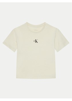 Calvin Klein Jeans T-Shirt IG0IG02136 Beżowy Boxy Fit ze sklepu MODIVO w kategorii Bluzki dziewczęce - zdjęcie 181162520