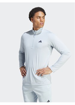 adidas Koszulka techniczna Train Essentials Seasonal Training IJ9620 Błękitny Regular Fit ze sklepu MODIVO w kategorii T-shirty męskie - zdjęcie 181162702