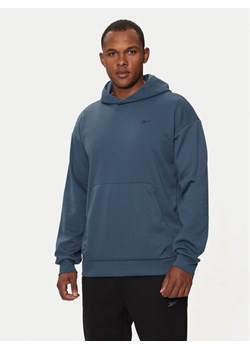 Reebok Bluza Strength Hoodie 100070154 Granatowy Regular Fit ze sklepu MODIVO w kategorii Bluzy męskie - zdjęcie 181163024