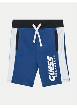 Guess Szorty sportowe L5RD01 KA6R4 Niebieski Regular Fit ze sklepu MODIVO w kategorii Spodenki chłopięce - zdjęcie 181163563