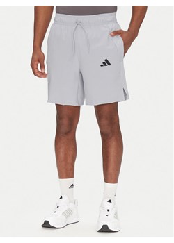 adidas Szorty sportowe Tech JM4178 Szary Regular Fit ze sklepu MODIVO w kategorii Spodenki męskie - zdjęcie 181169461