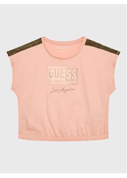 Guess T-Shirt J3GI11 K8HM3 Różowy Boxy Fit ze sklepu MODIVO w kategorii Bluzki dziewczęce - zdjęcie 181170033
