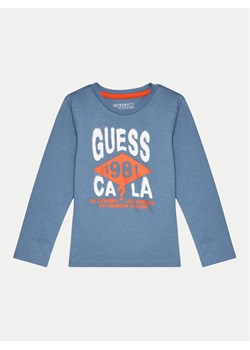 Guess Bluzka N4BI01I3Z14 Niebieski Regular Fit ze sklepu MODIVO w kategorii T-shirty chłopięce - zdjęcie 181170703