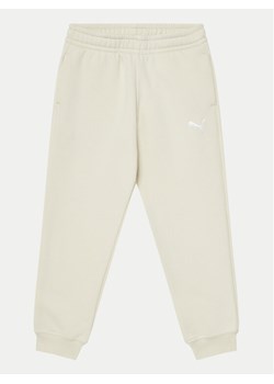 Puma Spodnie dresowe Ess 684898 Beżowy Regular Fit ze sklepu MODIVO w kategorii Spodnie dziewczęce - zdjęcie 181171114