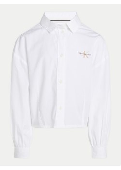 Calvin Klein Jeans Koszula IG0IG02525 Biały Relaxed Fit ze sklepu MODIVO w kategorii Koszule chłopięce - zdjęcie 181172323