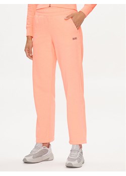DKNY Sport Spodnie dresowe DP3P3406 Pomarańczowy Wide Leg ze sklepu MODIVO w kategorii Spodnie damskie - zdjęcie 181172524