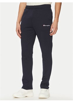 Champion Spodnie dresowe 220305 Granatowy Standard Fit ze sklepu MODIVO w kategorii Spodnie męskie - zdjęcie 181173163