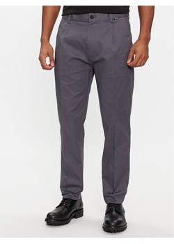 Calvin Klein Spodnie garniturowe Modern Twill Tapered Pleat K10K111490 Szary Slim Fit - id: 0000303118372 - marki Calvin Klein - 181173270 Calvin Klein Spodnie garniturowe Modern Twill Tapered Pleat K10K111490 Szary Slim Fit ze sklepu MODIVO w kategorii Spodnie męskie - zdjęcie 181173270
