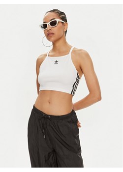 adidas Top adicolor 3-Stripes IN8377 Biały Slim Fit ze sklepu MODIVO w kategorii Bluzki damskie - zdjęcie 181173300