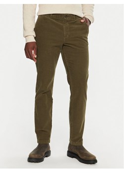 Tommy Hilfiger Spodnie materiałowe MW0MW32932 Khaki Regular Fit ze sklepu MODIVO w kategorii Spodnie męskie - zdjęcie 181174184