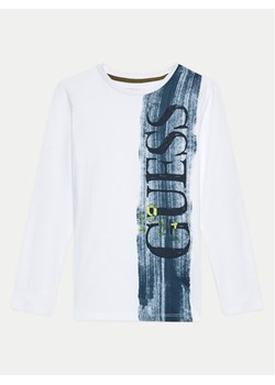 Guess Bluzka L4BI27 I3Z14 Biały Regular Fit - id: 0000304230967 - marki Guess - 181174694 Guess Bluzka L4BI27 I3Z14 Biały Regular Fit ze sklepu MODIVO w kategorii Bluzki dziewczęce - zdjęcie 181174694