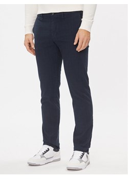 Tommy Hilfiger Chinosy Denton MW0MW32935 Granatowy Slim Fit ze sklepu MODIVO w kategorii Spodnie męskie - zdjęcie 181175143
