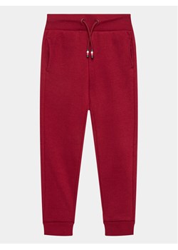 Tommy Hilfiger Spodnie dresowe Monotype KB0KB08278 D Bordowy Regular Fit ze sklepu MODIVO w kategorii Spodnie chłopięce - zdjęcie 181175913