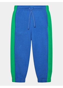 United Colors Of Benetton Spodnie dresowe 3FPPCF03W Niebieski Balloon Fit ze sklepu MODIVO w kategorii Spodnie chłopięce - zdjęcie 181177052
