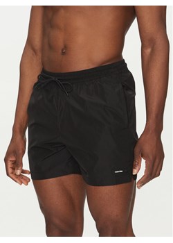 Calvin Klein Swimwear Szorty kąpielowe KM0KM01111 Czarny Regular Fit ze sklepu MODIVO w kategorii Kąpielówki - zdjęcie 181178143