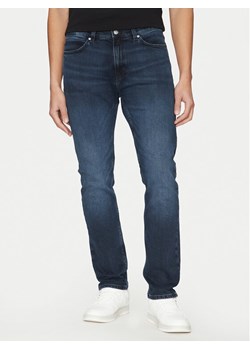 HUGO Jeansy 50530610 Niebieski Slim Fit ze sklepu MODIVO w kategorii Jeansy męskie - zdjęcie 181179252