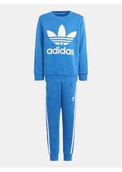 adidas Dres adicolor IR6899 Niebieski Regular Fit ze sklepu MODIVO w kategorii Dresy chłopięce - zdjęcie 181179500