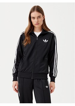 adidas Bluza adicolor Classic Firebird JC8251 Czarny Loose Fit ze sklepu MODIVO w kategorii Bluzy damskie - zdjęcie 181180513