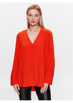 Calvin Klein Bluzka K20K205688 Pomarańczowy Regular Fit ze sklepu MODIVO w kategorii Bluzki damskie - zdjęcie 181182522