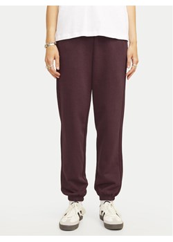 JJXX Spodnie dresowe Abbie 12223960 Fioletowy Relaxed Fit ze sklepu MODIVO w kategorii Spodnie damskie - zdjęcie 181182813