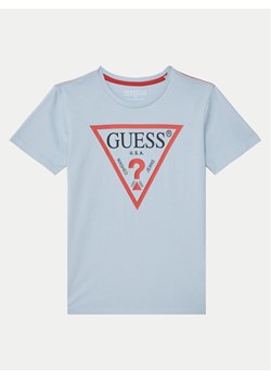 Guess T-Shirt L73I55 K8HM0 Błękitny Regular Fit ze sklepu MODIVO w kategorii T-shirty chłopięce - zdjęcie 181183261
