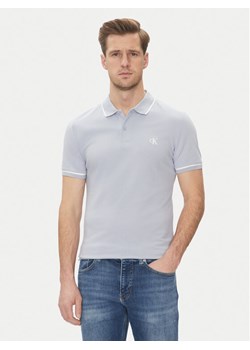 Calvin Klein Jeans Polo J30J315603 Niebieski Slim Fit ze sklepu MODIVO w kategorii T-shirty męskie - zdjęcie 181184260
