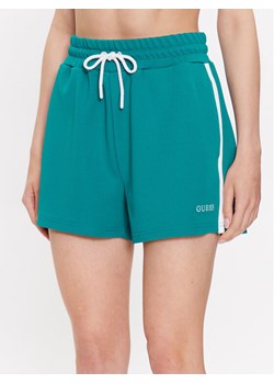 Guess Szorty sportowe Signature V3GD00 KBO62 Zielony Loose Fit ze sklepu MODIVO w kategorii Szorty - zdjęcie 181184434