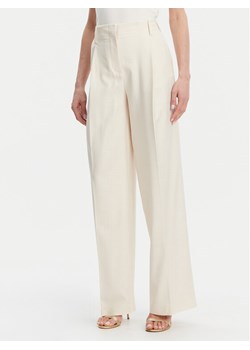 Simona Corsellini Spodnie materiałowe P25CPPA01901 Écru Relaxed Fit ze sklepu MODIVO w kategorii Spodnie damskie - zdjęcie 181184864