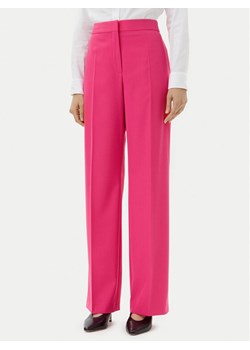 HUGO Spodnie materiałowe Hambali 50537611 Różowy Relaxed Fit ze sklepu MODIVO w kategorii Spodnie damskie - zdjęcie 181185141