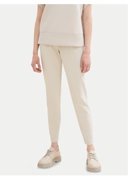 Tom Tailor Spodnie materiałowe 1008375 Beżowy Loose Fit ze sklepu MODIVO w kategorii Spodnie damskie - zdjęcie 181185430
