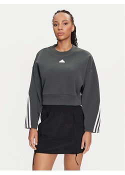 adidas Bluza Future Icons 3-Stripes IS3879 Zielony Loose Fit ze sklepu MODIVO w kategorii Bluzy damskie - zdjęcie 181185724
