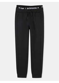 Karl Lagerfeld Kids Spodnie dresowe Z30263 S Czarny Regular Fit ze sklepu MODIVO w kategorii Spodnie chłopięce - zdjęcie 181186121
