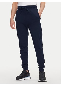 HUGO Spodnie dresowe Liam 50540918 Granatowy Regular Fit ze sklepu MODIVO w kategorii Spodnie męskie - zdjęcie 181186683