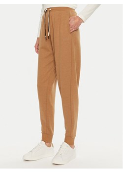 Boss Spodnie dresowe CP Stripe 50524759 Beżowy Regular Fit ze sklepu MODIVO w kategorii Spodnie damskie - zdjęcie 181186812