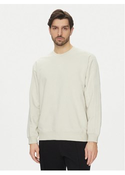 adidas Bluza Premium Essentials JD3304 Beżowy Loose Fit ze sklepu MODIVO w kategorii Bluzy męskie - zdjęcie 181188052