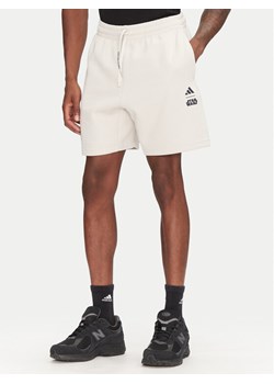 adidas Szorty sportowe Star Wars The Mandalorian™ JI5721 Beżowy Regular Fit ze sklepu MODIVO w kategorii Spodenki męskie - zdjęcie 181188724